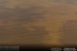 On March 18, 2011, I took a flight over the Gulf Coast from Horn Island Mississippi all the way to Raccoon Island to check on the status of wildlife, marshes, and other impacts from the BP Oil Spill.  When we were slightly east of Grand Isle and Grand Terre island I started to see those familiar reddisheaks in the water, which extended from east of Grand Isle, Elmer