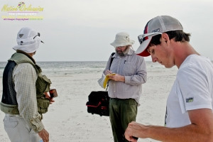 8/9/10 lat 30,14.5535N, long  88,43.3291W, Sampling with Boston Chemical Data, www.labs.pro , Pictured here is Strongbear and Jim Stiles collecting and documenting  weathered tar ball samples, south side of Horn Island.